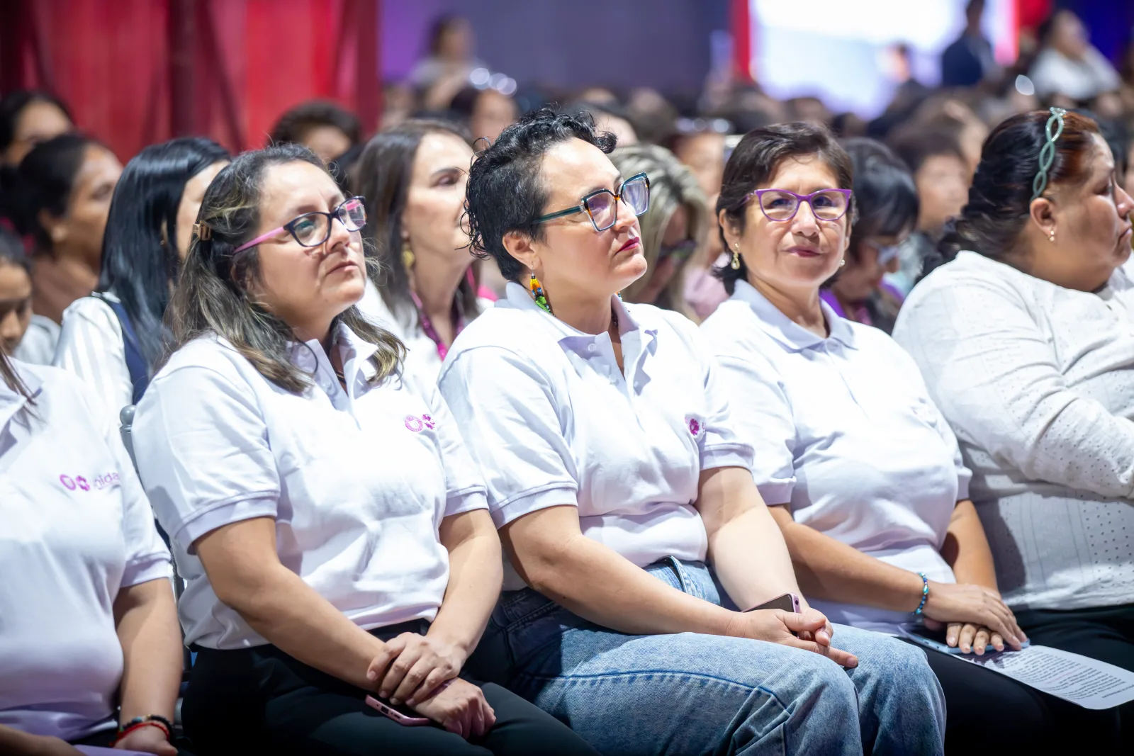 Comunidad de mujeres UNIDAS reunidas durante el evento